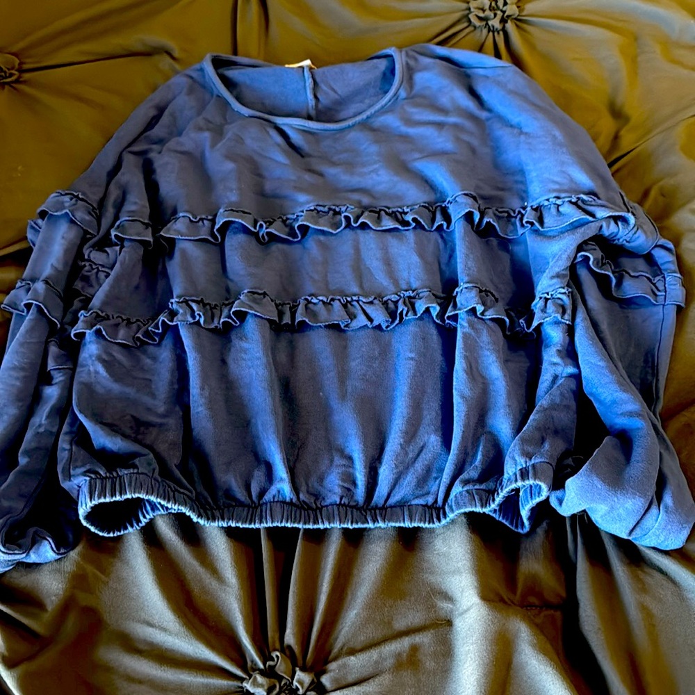 Cropped blue top with ruffles